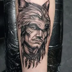Black and grey portrait tattoo by Elora Hinton