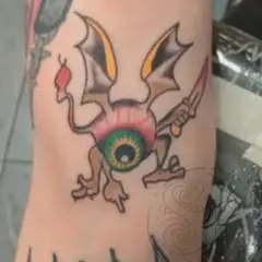 Winged eyeball tattoo by James Hinton
