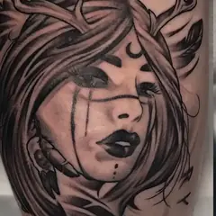 Black and grey portrait tattoo by Mark