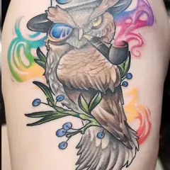 Color owl tattoo by Mark