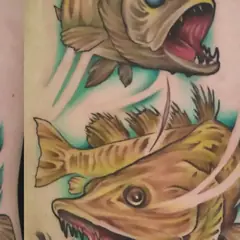 Color fish tattoo by Mark